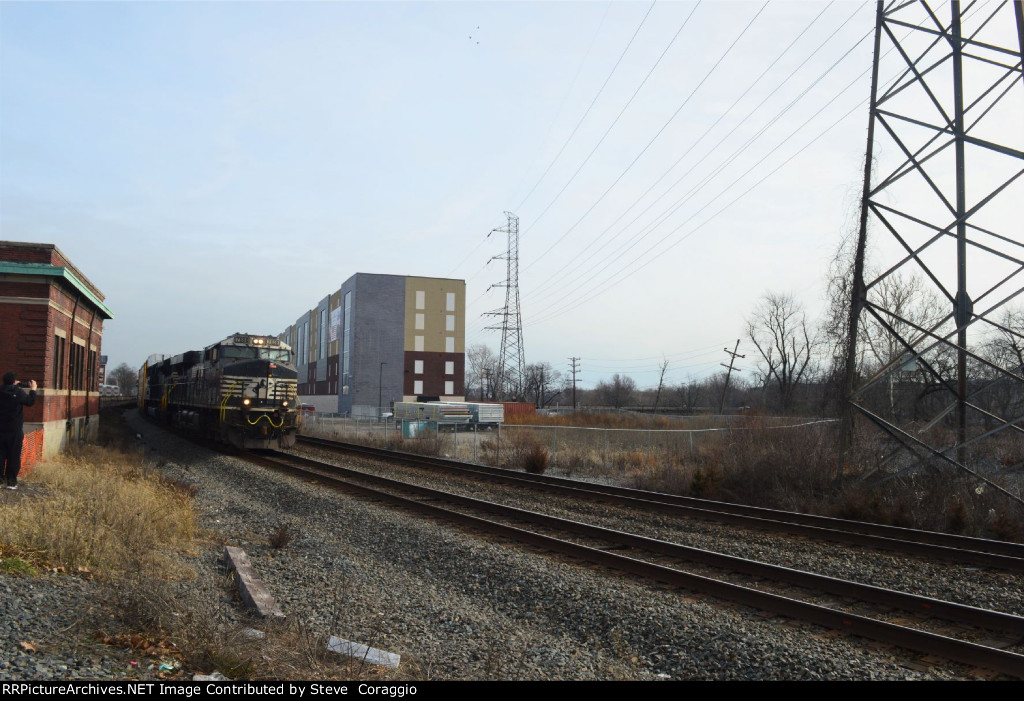 Passing the Old CNJ Station and railfan Waves to Train Crew